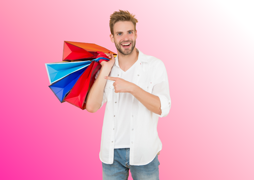 man holding shopping bags